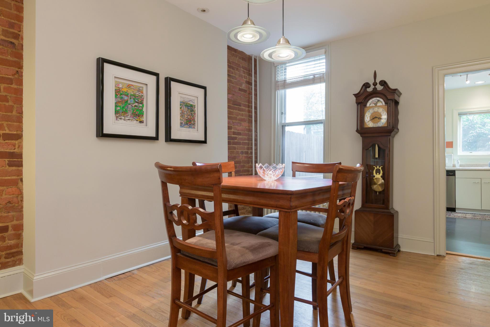 1450 T Street Northwest Washington, DC 20009 - Photo 6 of 14 a view of a dining room with furniture window and wooden floor