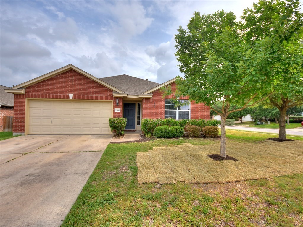 2500 Rusk Court Round Rock, TX 78665 - Photo 1 of 1 a front view of a house with a yard