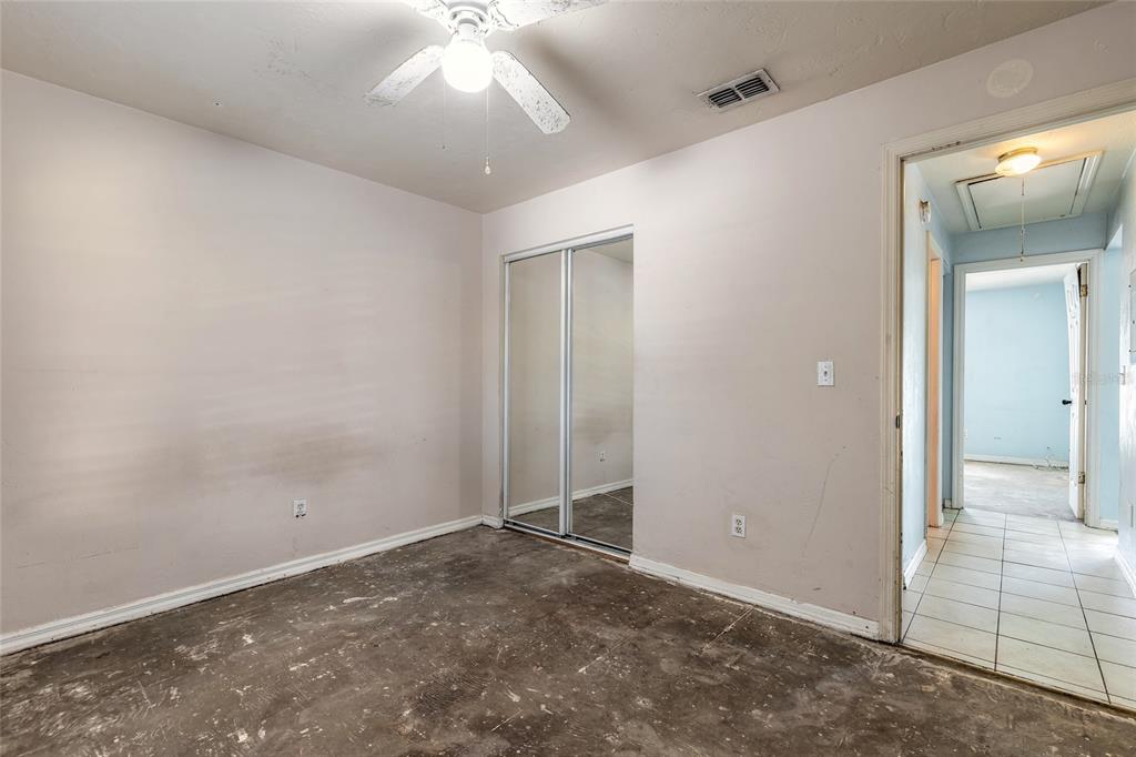 1678 Espanola Avenue Daytona Beach, FL 32117 - Photo 15 of 26 an empty room with fan