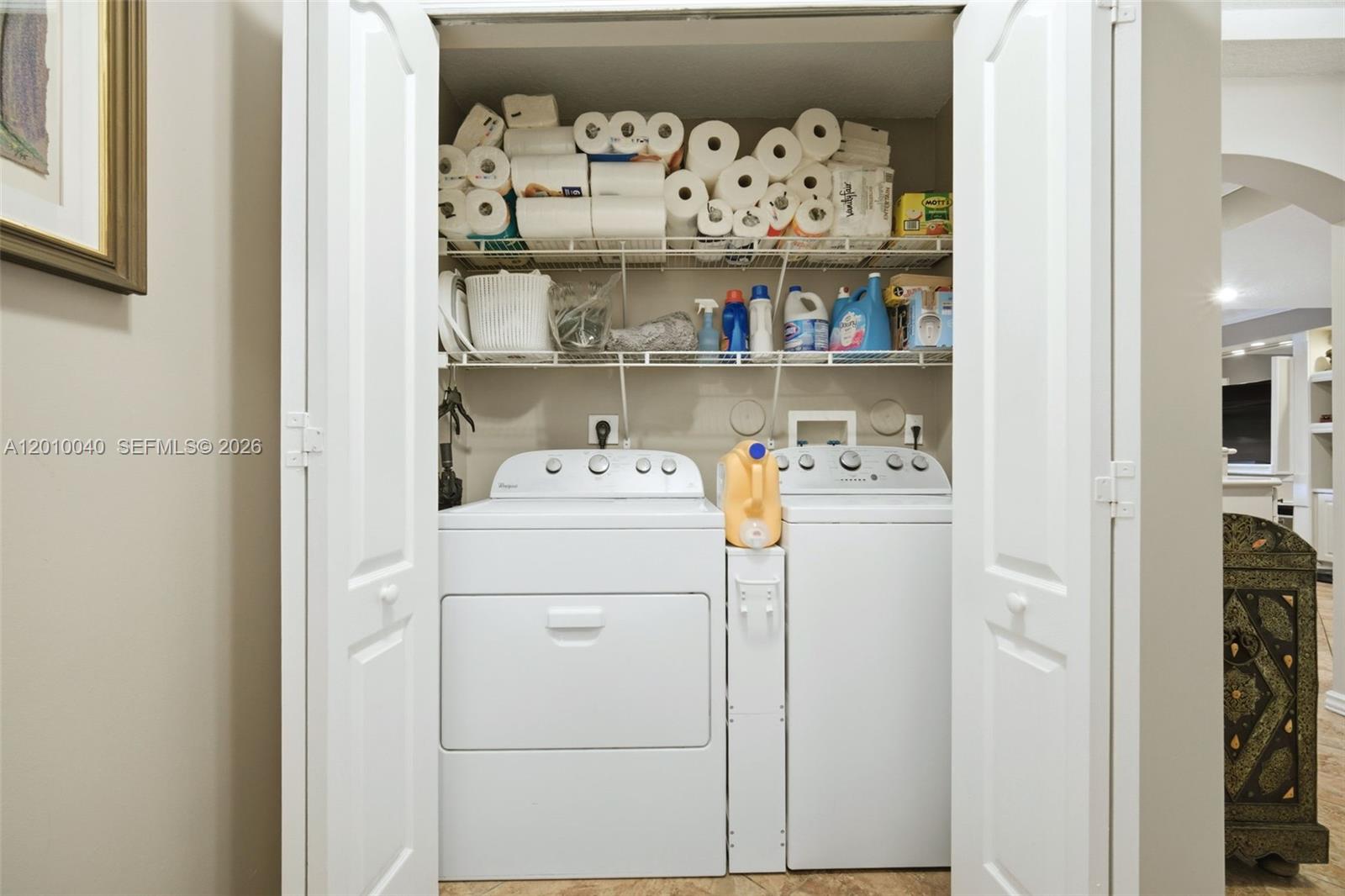 12978 Southwest 29th Court Miramar, FL 33027 - Photo 11 of 32 a utility room with dryer and washer