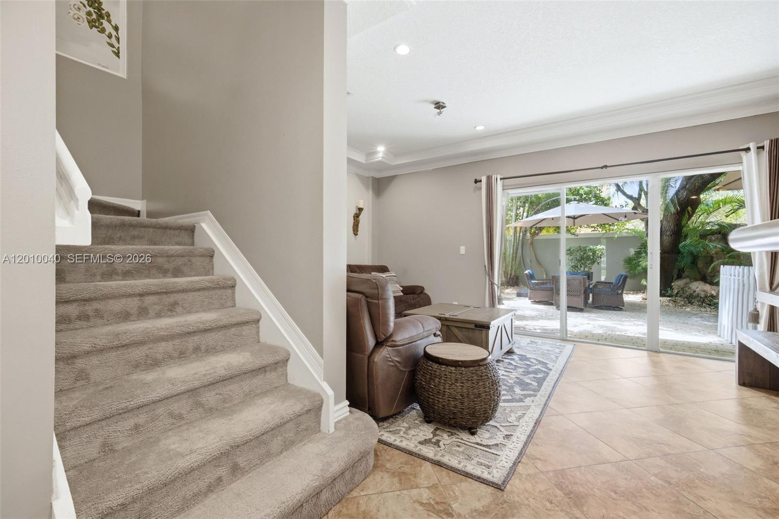 12978 Southwest 29th Court Miramar, FL 33027 - Photo 17 of 32 a living room with furniture and a large window