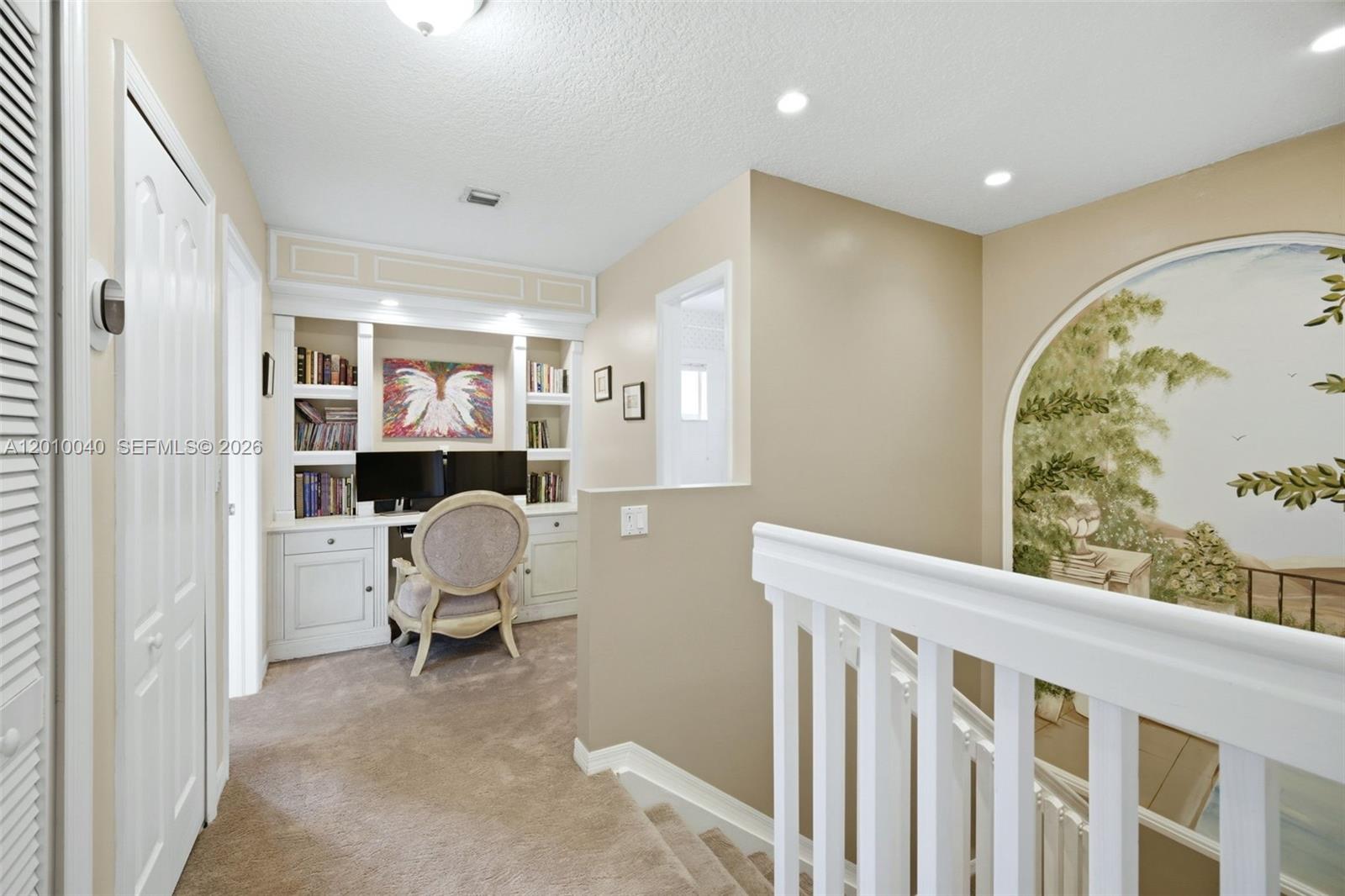 12978 Southwest 29th Court Miramar, FL 33027 - Photo 18 of 32 a view of a workspace with furniture and a window