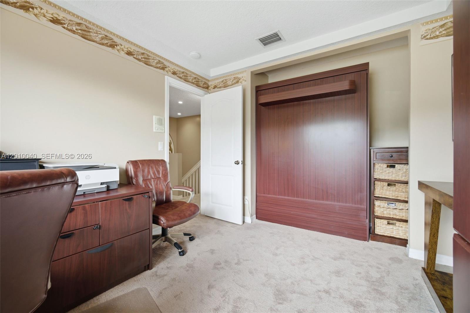 12978 Southwest 29th Court Miramar, FL 33027 - Photo 25 of 32 a view of workspace with furniture and closet