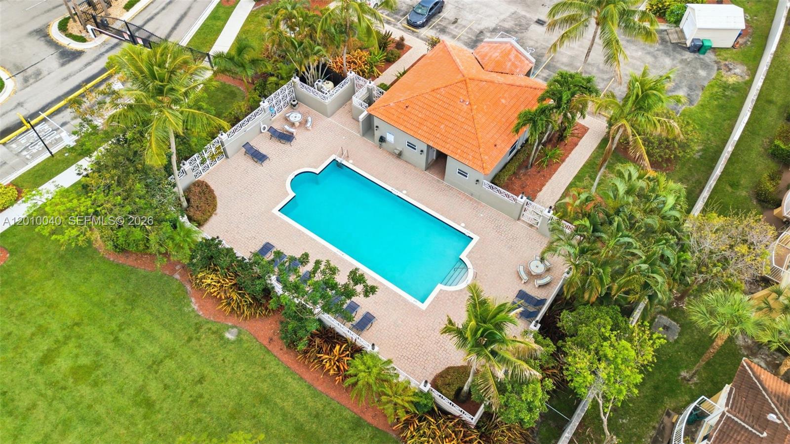 12978 Southwest 29th Court Miramar, FL 33027 - Photo 30 of 32 an aerial view of a house with a yard and garden