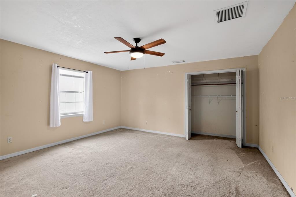 4553 Southeast 14th Street Ocala, FL 34471 - Photo 21 of 28 a view of an empty room with a window