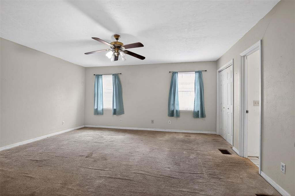 4553 Southeast 14th Street Ocala, FL 34471 - Photo 22 of 28 a view of an empty room with a window