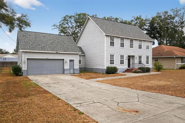 a front view of a house with yard