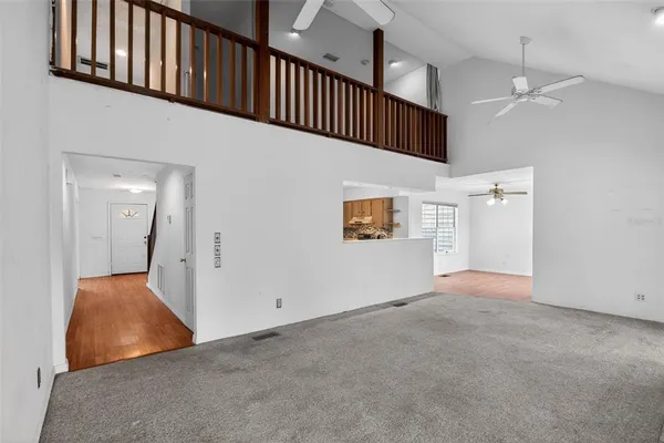 a view of an entryway with wooden floor