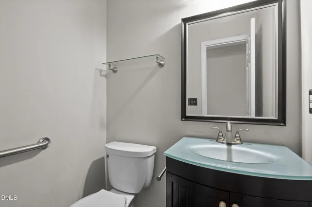 a bathroom with a sink and a toilet