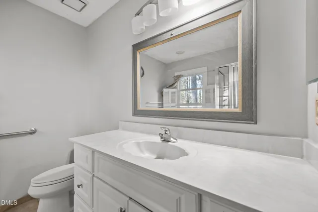 a bathroom with a sink and a toilet