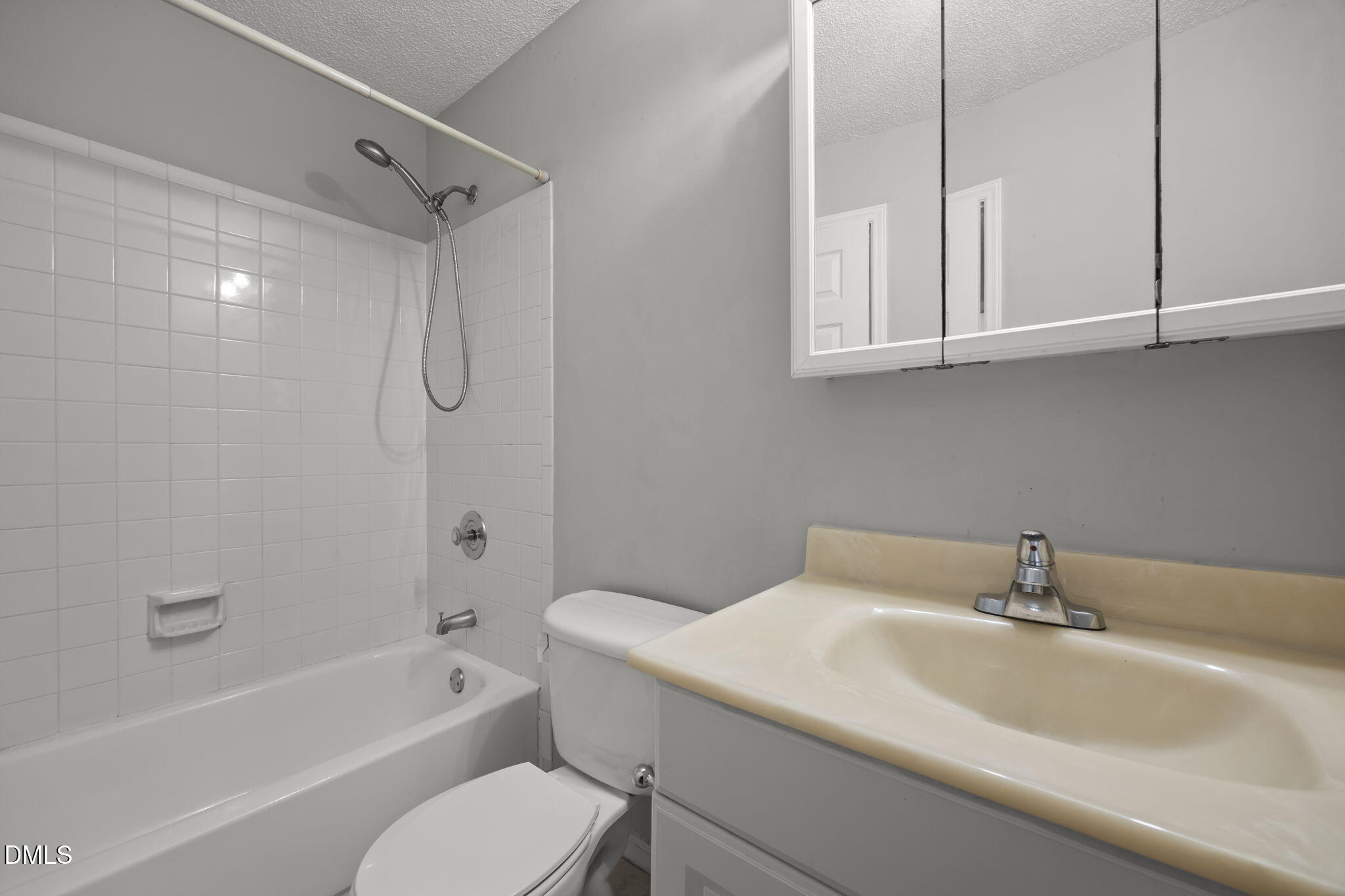 4700 Tolley Court Raleigh, NC 27616 - Photo 33 of 38 a bathroom with a sink toilet and shower