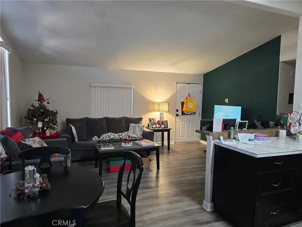 a bedroom with a bed and curtain
