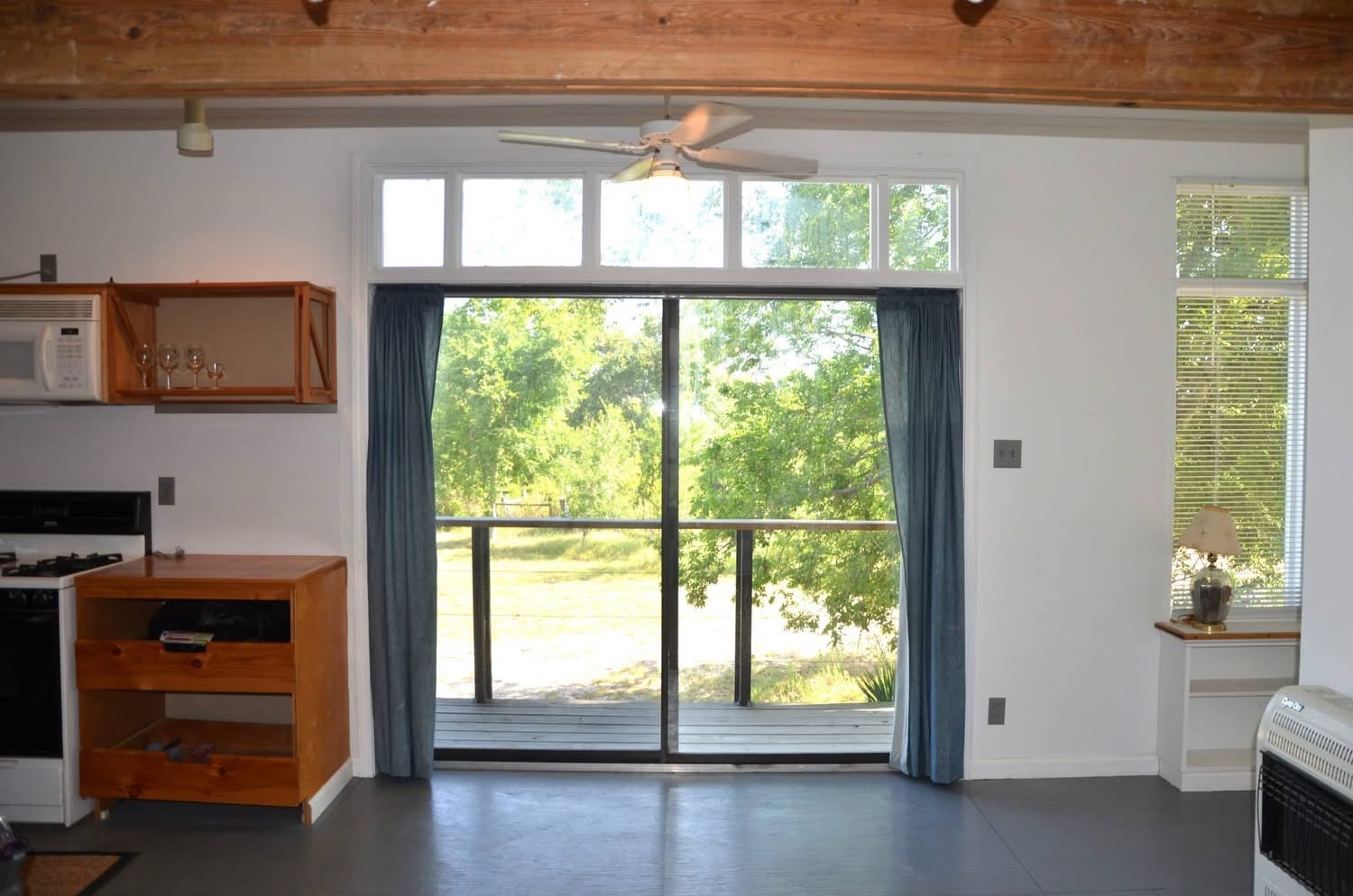 143 Davis Road Bedias, TX 77831 - Photo 3 of 8 a view of an empty room with a window