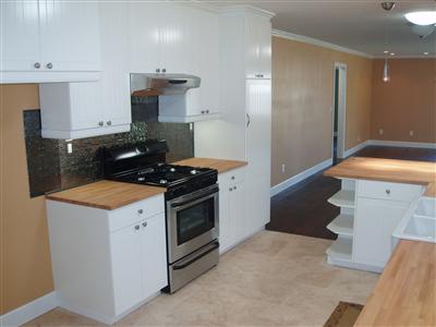 1828 Austin Way Santa Rosa, CA 95404 - Photo 5 of 12 a kitchen with granite countertop a stove and a sink