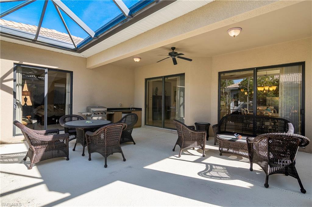 1349 Serrano Circle Naples, FL 34105 - Photo 26 of 37 a view of a dining room with furniture