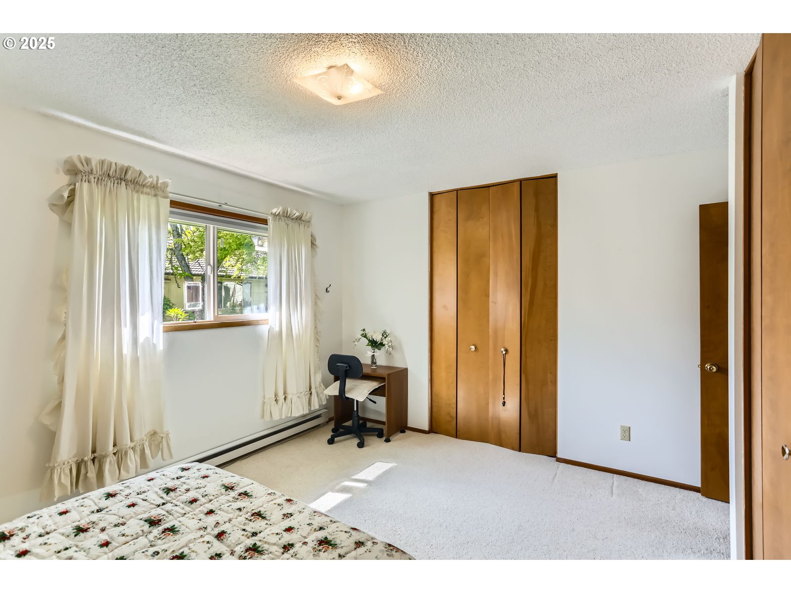 12330 Southeast Main Street Portland, OR 97233 - Photo 16 of 28 a view of a bedroom with a window