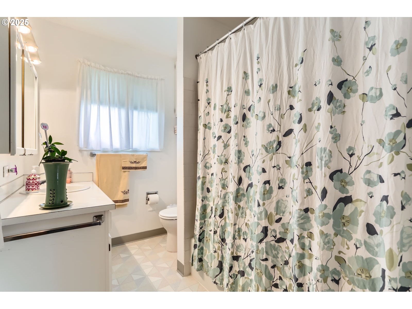 12330 Southeast Main Street Portland, OR 97233 - Photo 18 of 28 a bathroom with a granite countertop sink a toilet and a mirror
