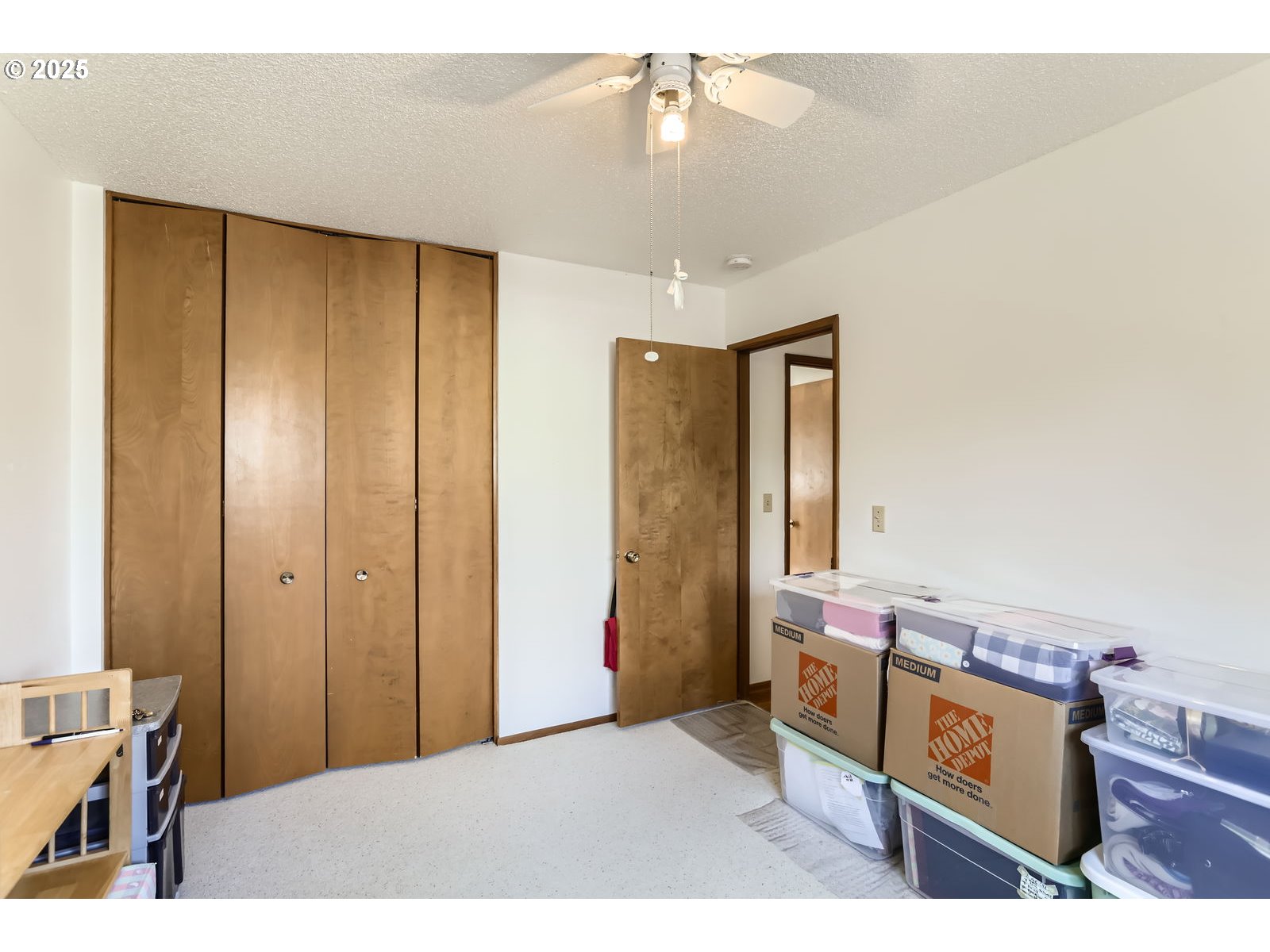 12330 Southeast Main Street Portland, OR 97233 - Photo 21 of 28 a living room with a bed furniture and a window