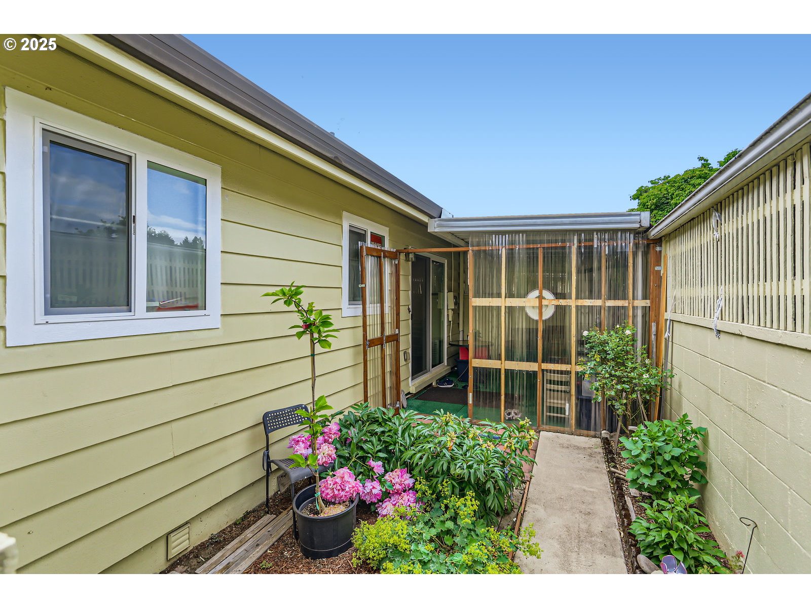 12330 Southeast Main Street Portland, OR 97233 - Photo 24 of 28 a view of a backyard with potted plants