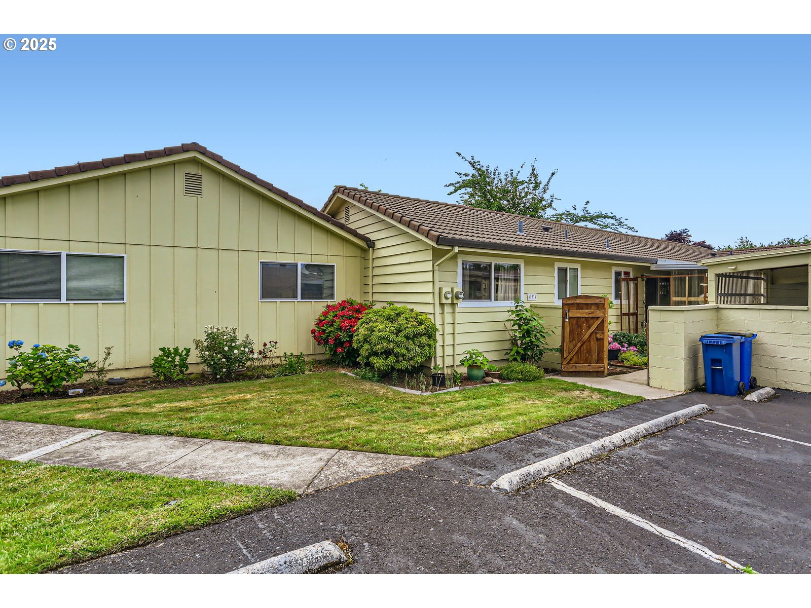 12330 Southeast Main Street Portland, OR 97233 - Photo 25 of 28 a view of a house with backyard and garden