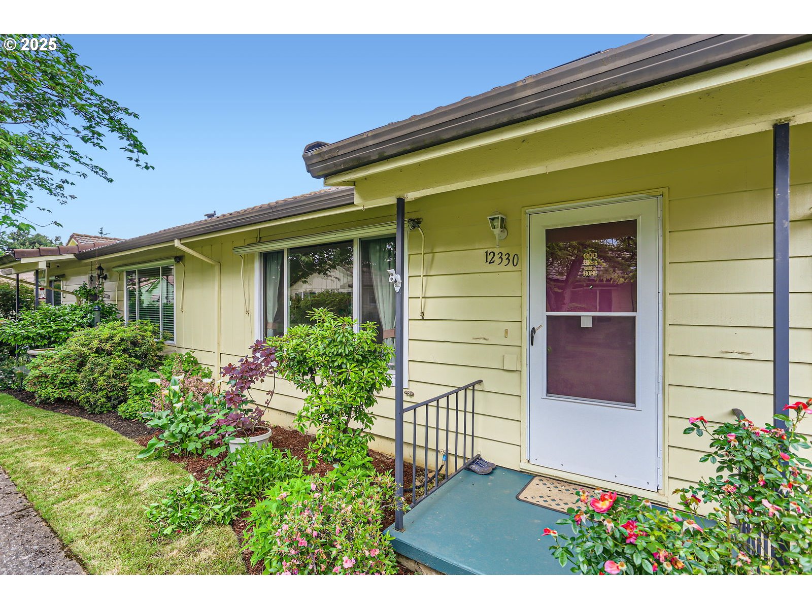 12330 Southeast Main Street Portland, OR 97233 - Photo 4 of 28 a view of entrance of the house