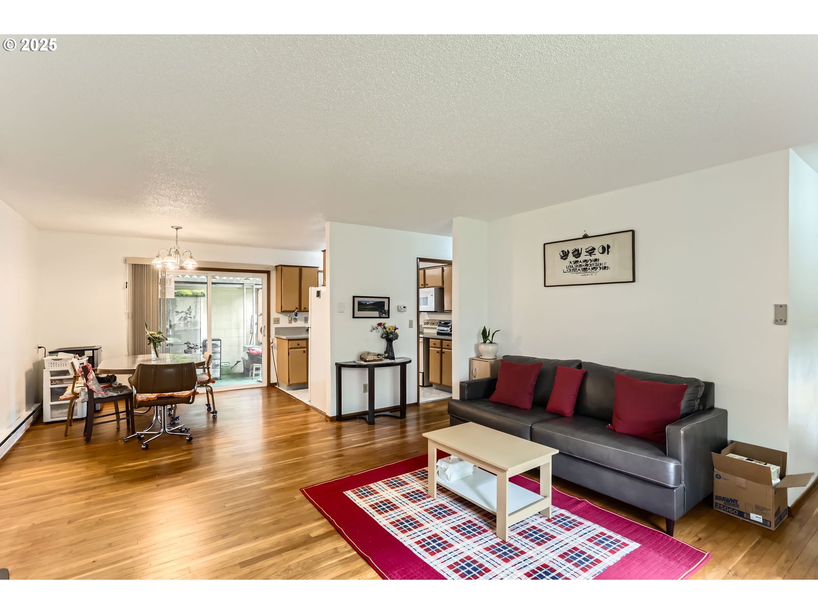 12330 Southeast Main Street Portland, OR 97233 - Photo 7 of 28 a living room with furniture and wooden floor