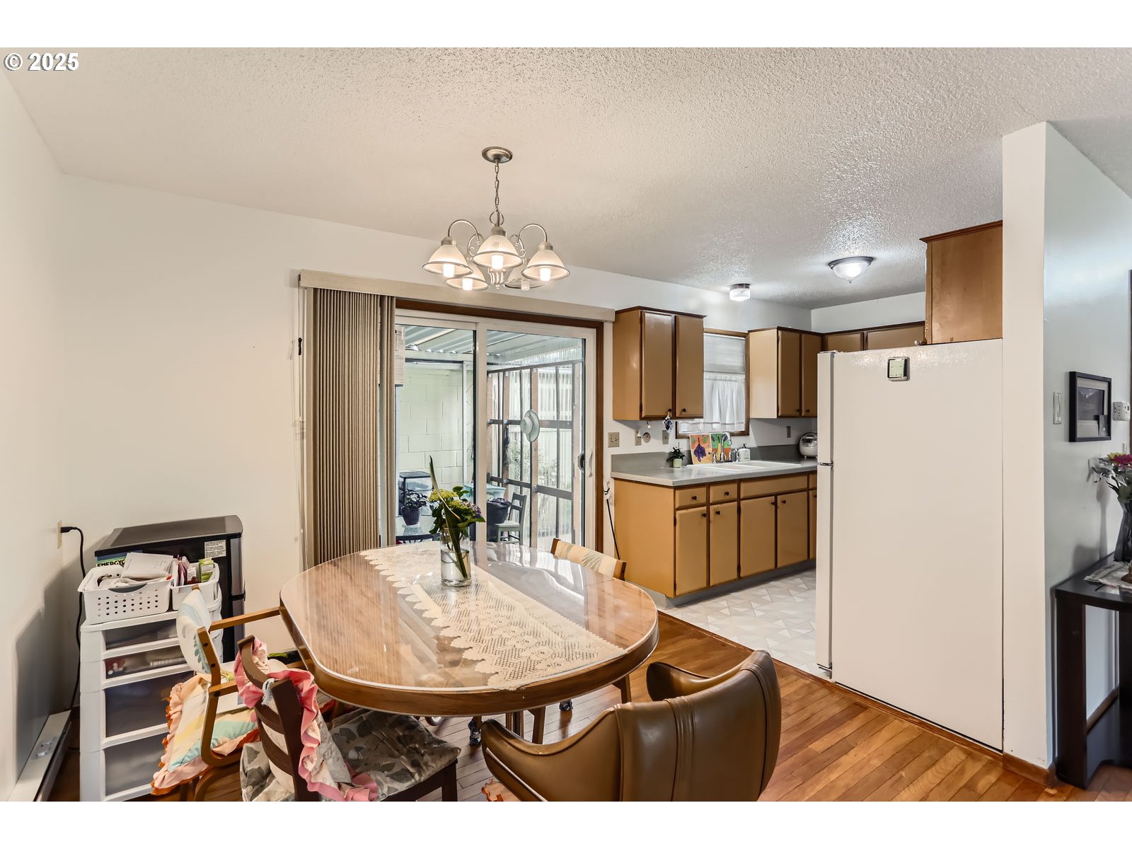 12330 Southeast Main Street Portland, OR 97233 - Photo 9 of 28 a kitchen with a table and chairs