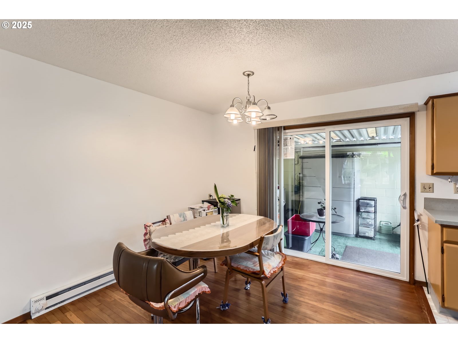 12330 Southeast Main Street Portland, OR 97233 - Photo 10 of 28 a living room with furniture and a chandelier