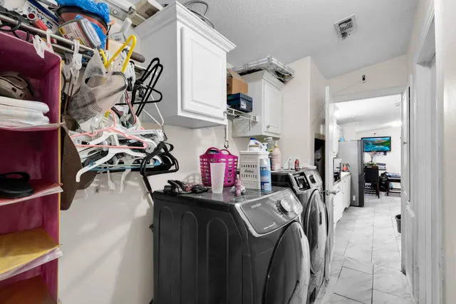 a view of a living room and bathroom