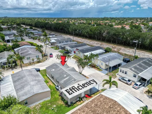 an aerial view of a house with a garden