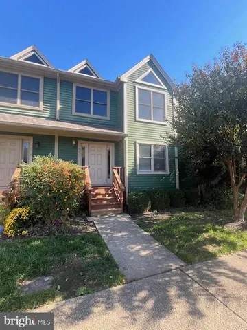 a city view with wooden bridge