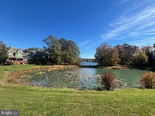 a view of balcony with wooden floor and outdoor space