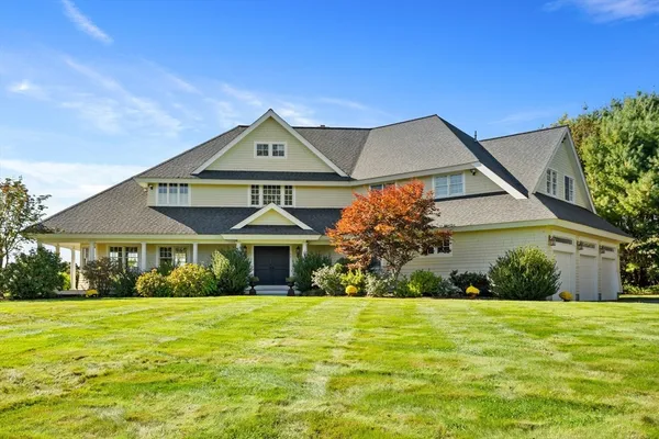 an aerial view of a house with a garden