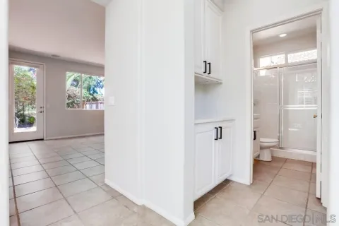 a view of a bathroom with a shower and a toilet