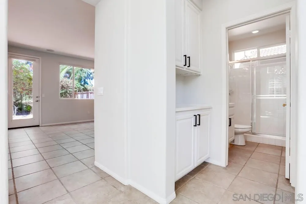 5423 Foxtail Loop Carlsbad, CA 92010 - Photo 21 of 53 a view of a bathroom with a shower and a toilet