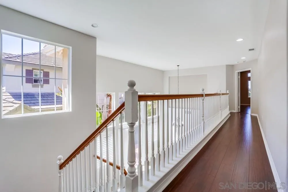 5423 Foxtail Loop Carlsbad, CA 92010 - Photo 26 of 53 a view of a hallway with window