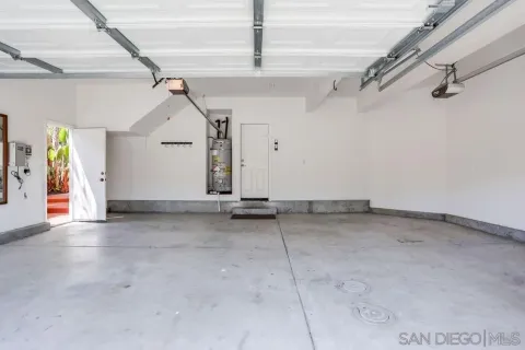 a view of a house with sitting area and garden