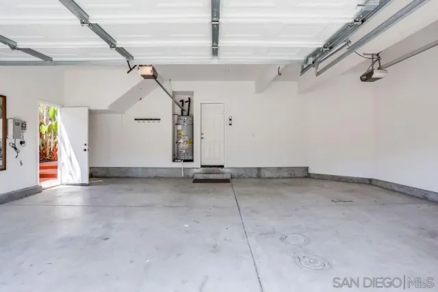 a view of a house with sitting area and garden