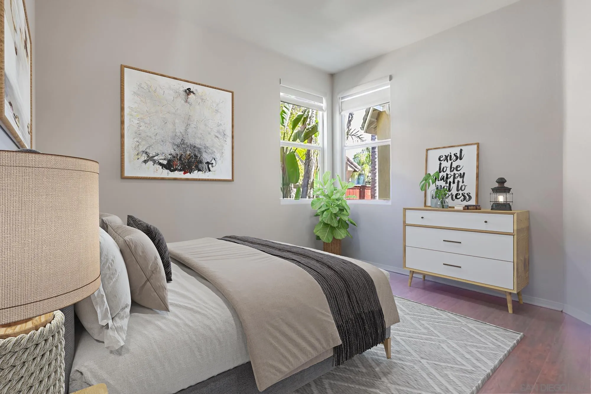 5423 Foxtail Loop Carlsbad, CA 92010 - Photo 9 of 53 a bedroom with a bed and painting on the wall