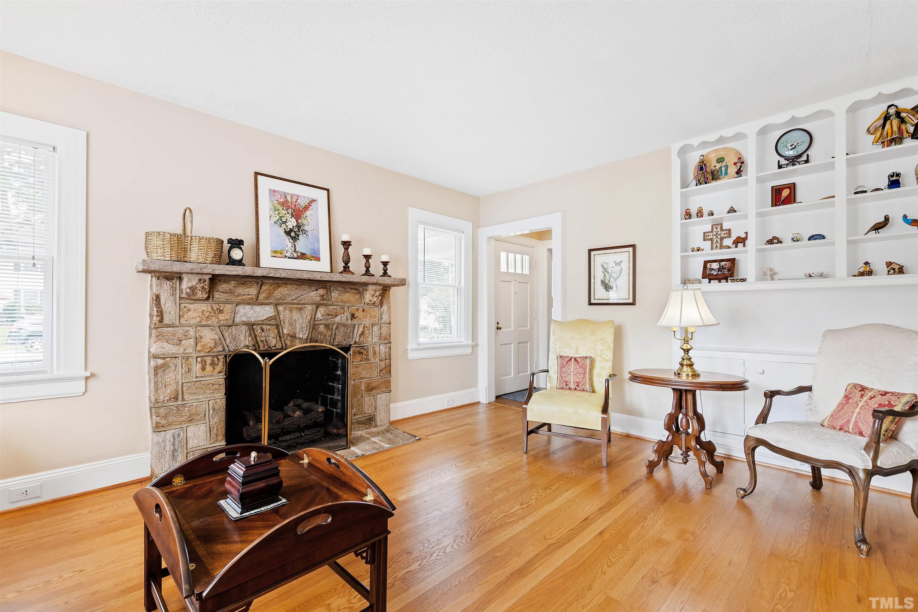110 Shepherd Street Raleigh, NC 27607 - Photo 16 of 41 a living room with furniture and a fireplace