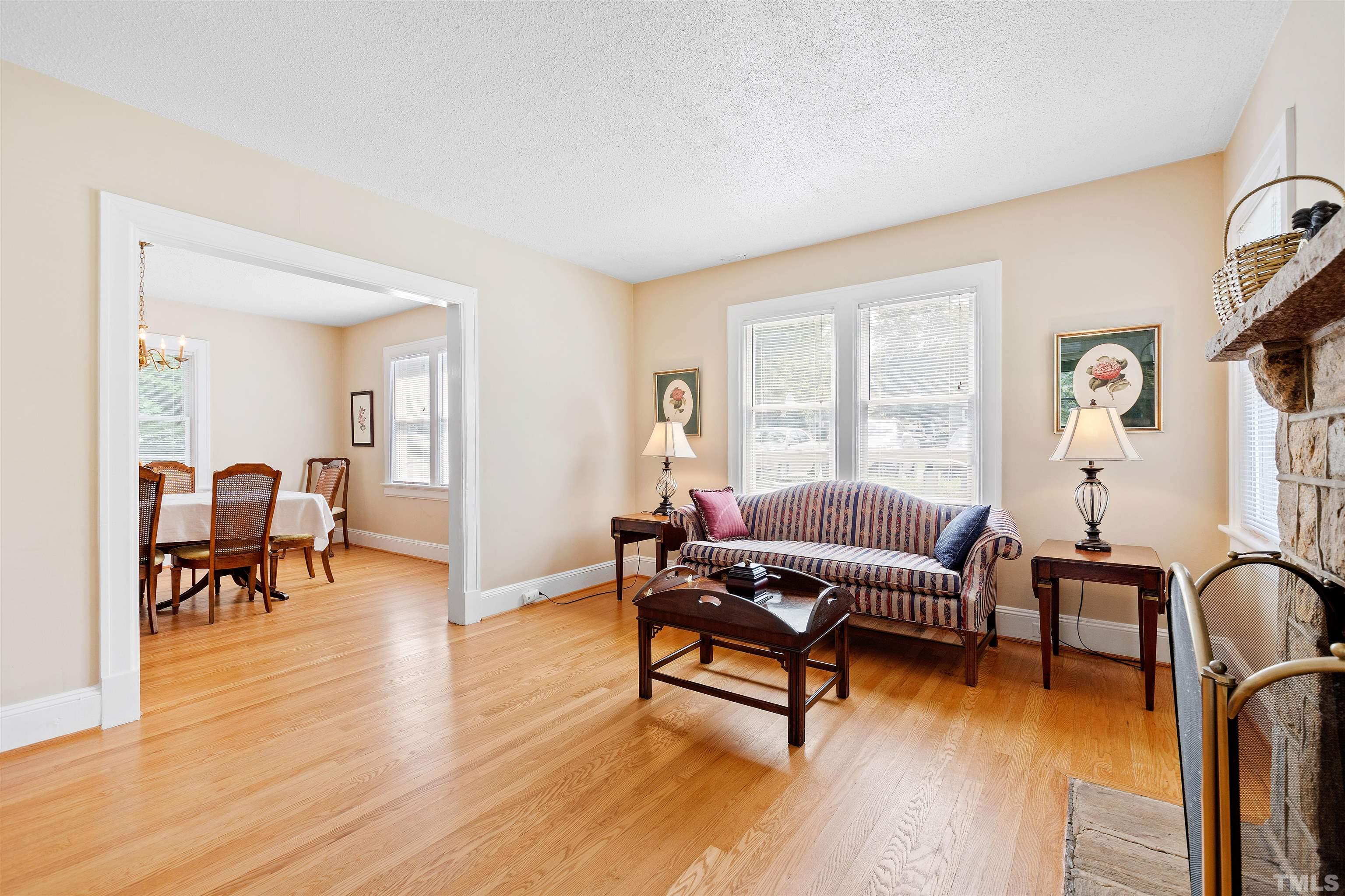 110 Shepherd Street Raleigh, NC 27607 - Photo 18 of 41 a living room with furniture and a wooden floor