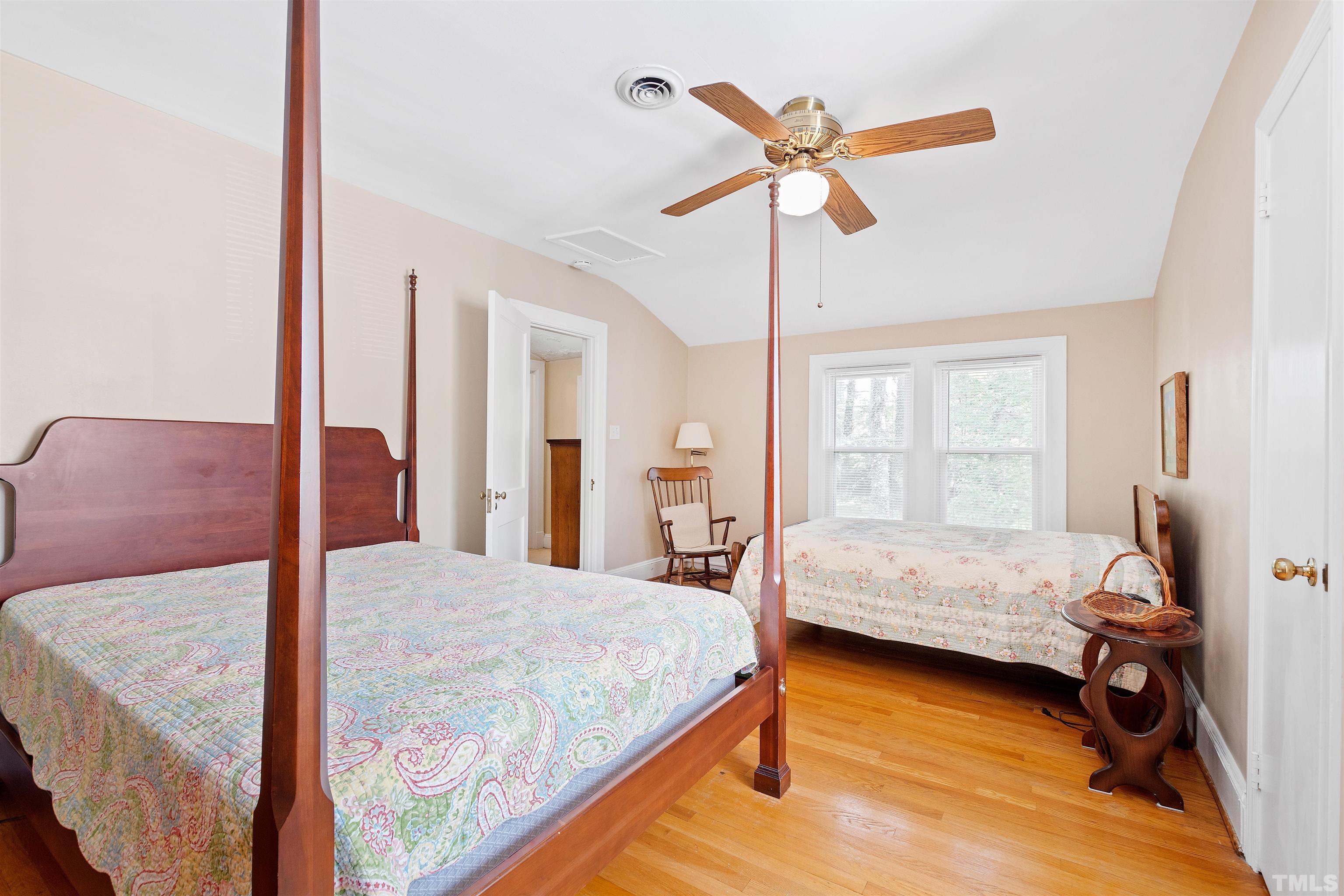 110 Shepherd Street Raleigh, NC 27607 - Photo 33 of 41 a bedroom with a bed and a window