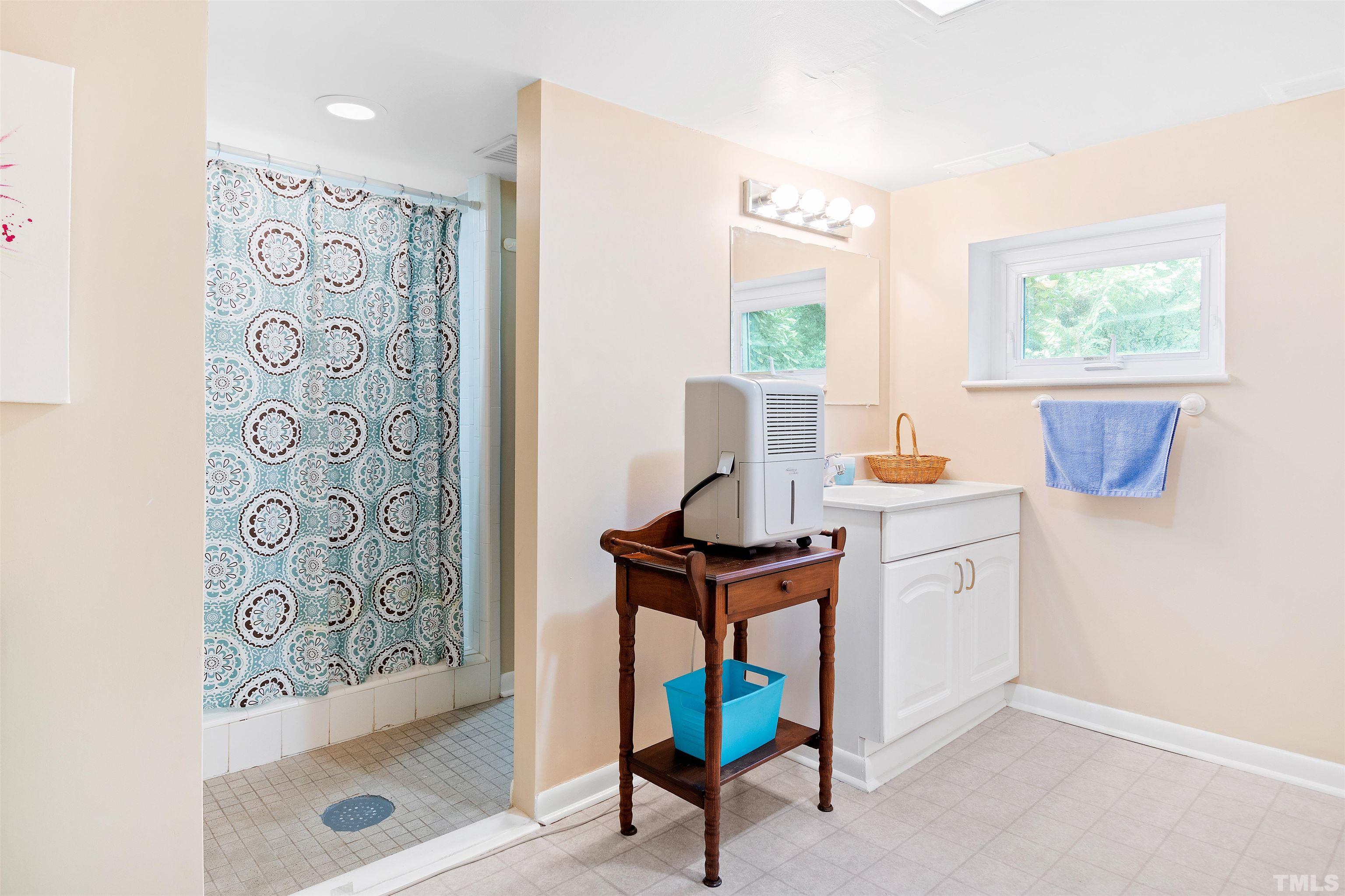 110 Shepherd Street Raleigh, NC 27607 - Photo 39 of 41 a view of a workspace with furniture and a window