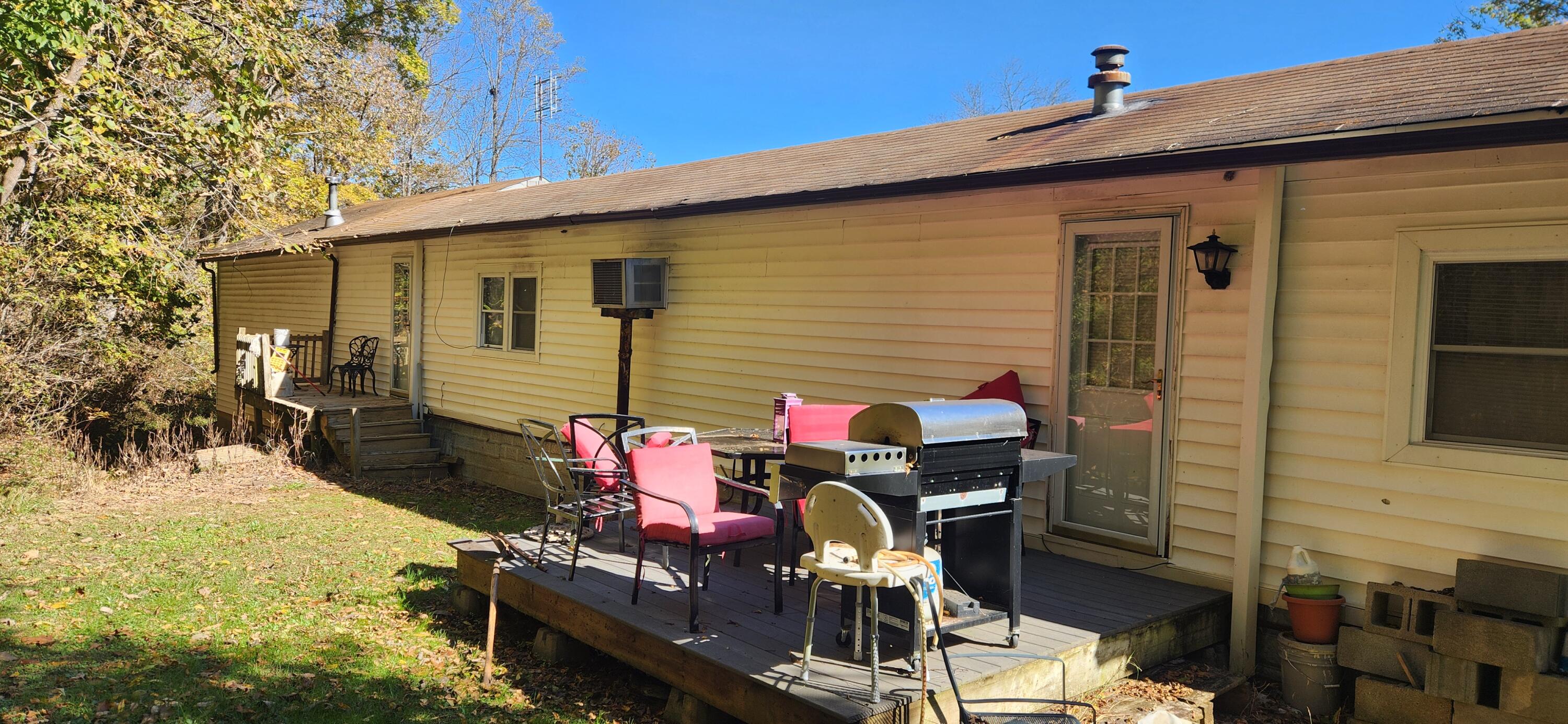 668 Pico Road Buchanan, VA 24066 - Photo 11 of 13 a backyard of a house with seating space
