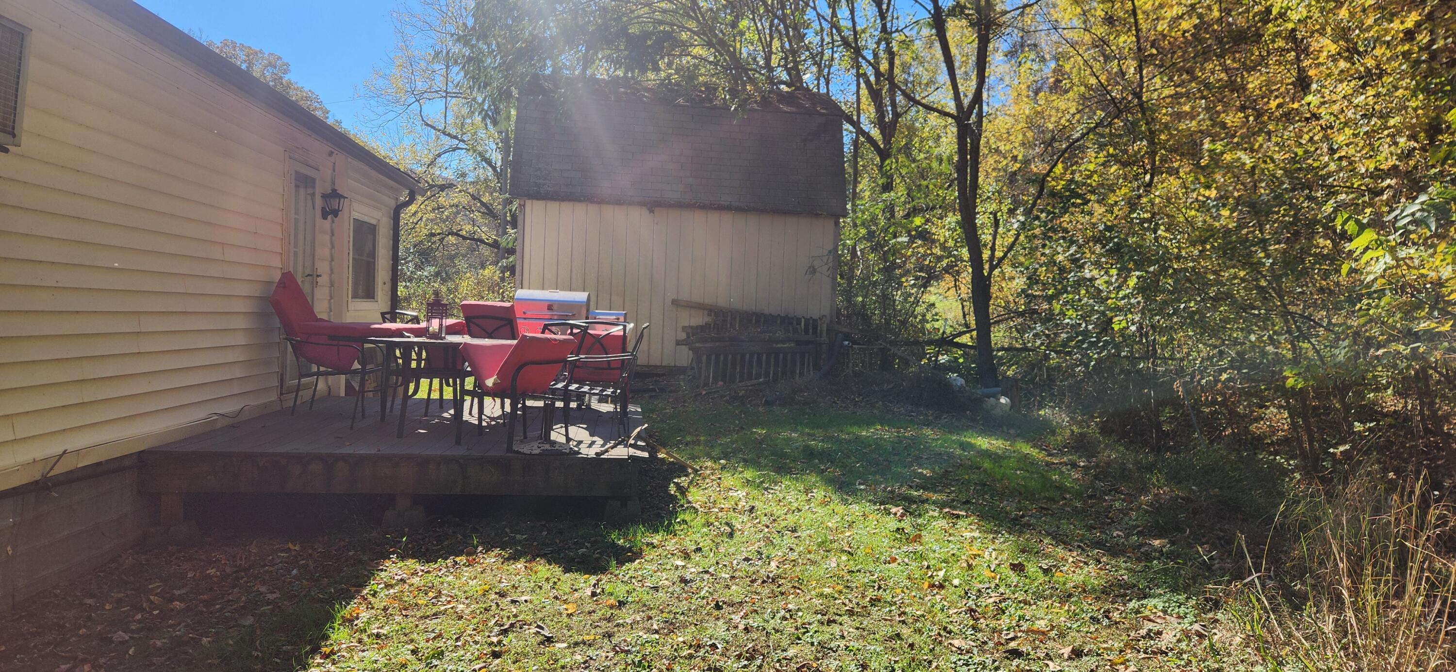 668 Pico Road Buchanan, VA 24066 - Photo 12 of 13 a view of a chairs and table in the patio