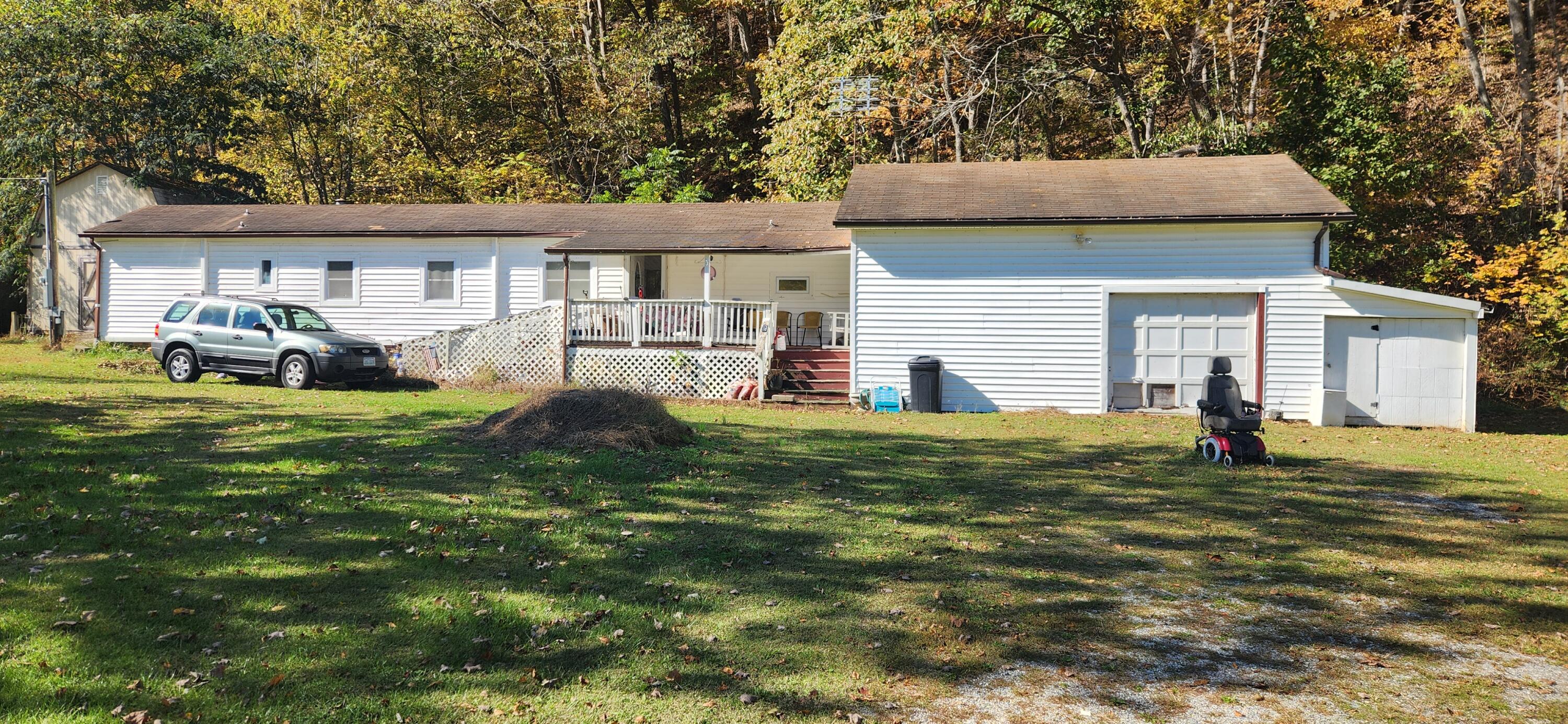 668 Pico Road Buchanan, VA 24066 - Photo 2 of 13 a front view of house with yard outdoor seating and yard