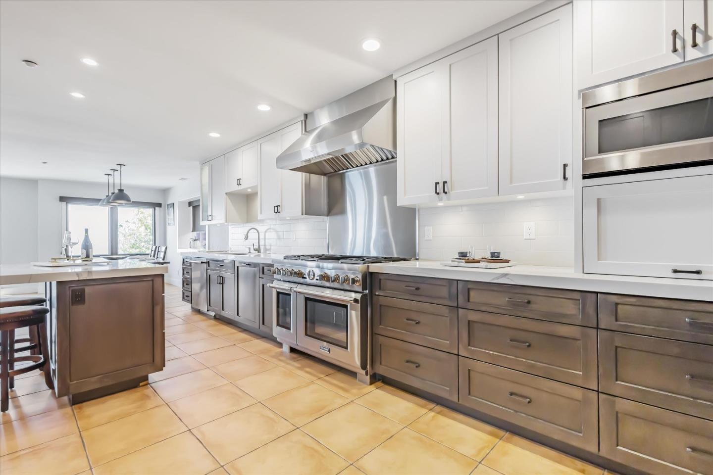 327 Farallon Avenue Pacifica, CA 94044 - Photo 15 of 74 a kitchen with stainless steel appliances granite countertop a stove a sink and a refrigerator