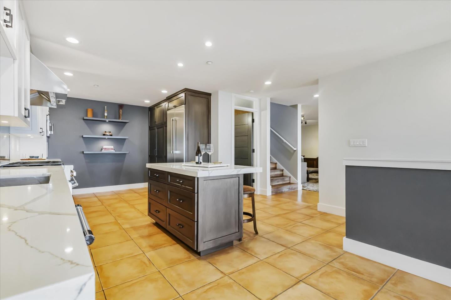 327 Farallon Avenue Pacifica, CA 94044 - Photo 16 of 74 a kitchen with stainless steel appliances a stove and cabinets