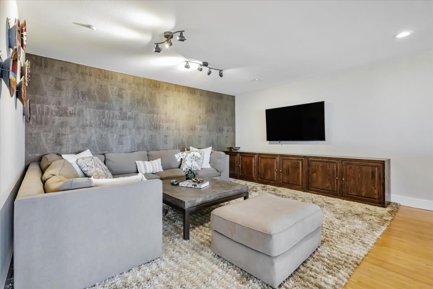 327 Farallon Avenue Pacifica, CA 94044 - Photo 18 of 74 a living room with furniture and a flat screen tv