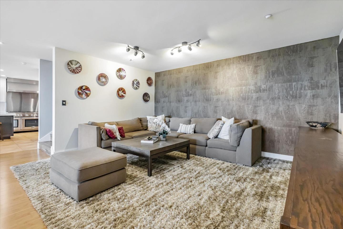 327 Farallon Avenue Pacifica, CA 94044 - Photo 19 of 74 a living room with furniture and wooden floor